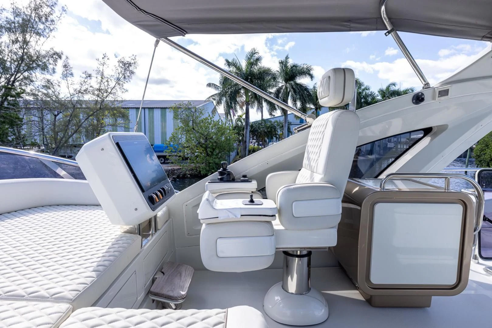 a car with a couple of seats aboard MEANT TO BE Yacht for Sale