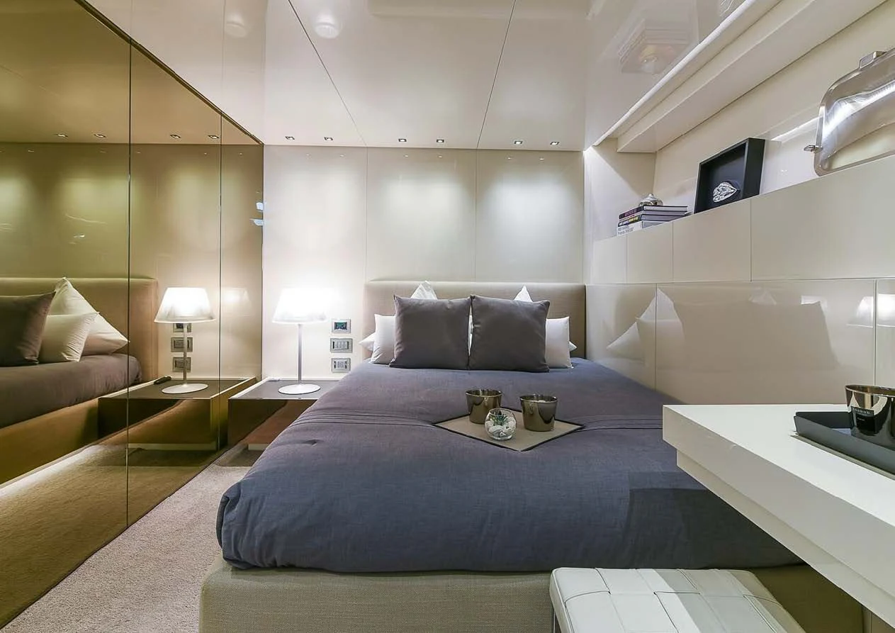 a bed in a room aboard MUSHA Yacht for Sale