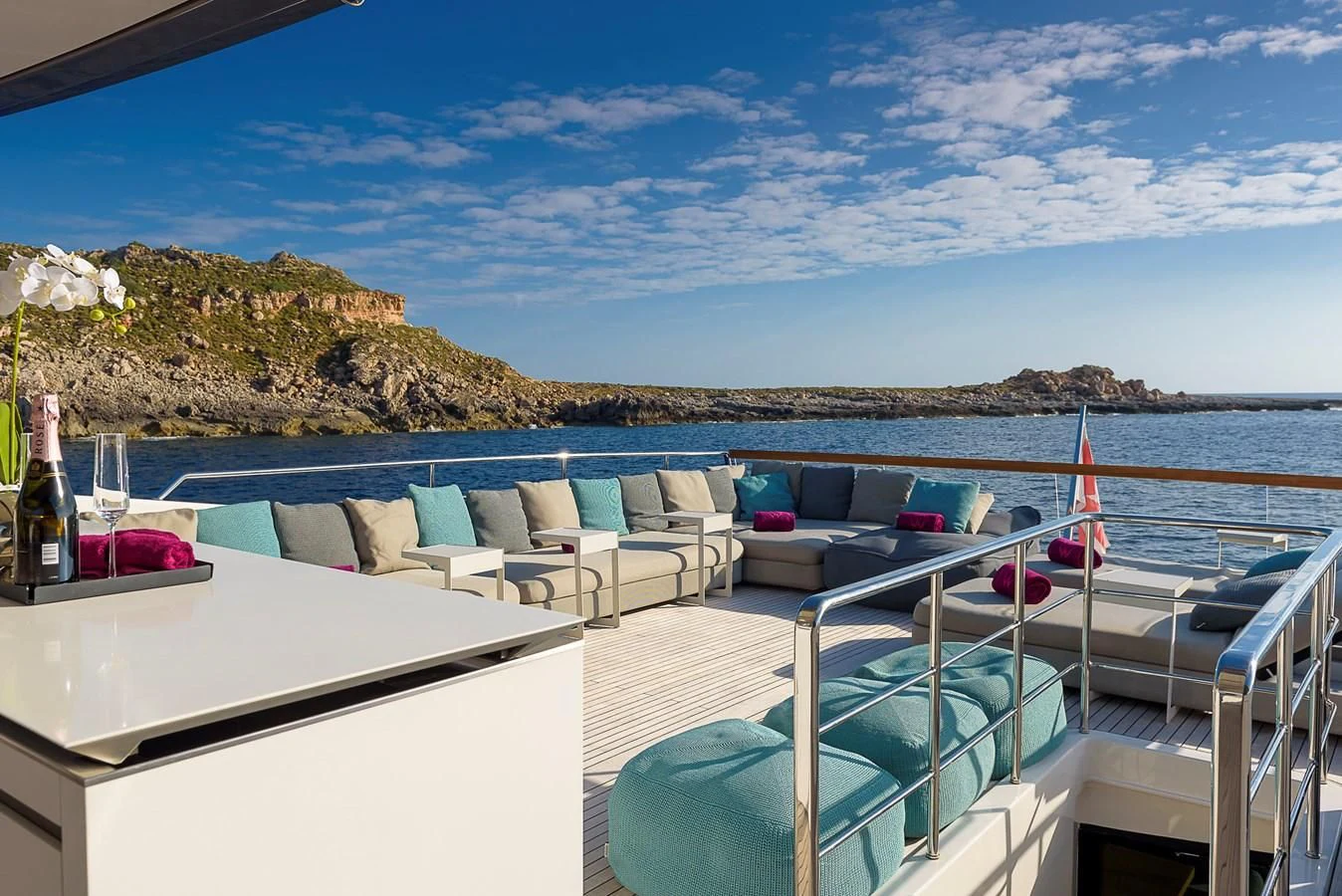 a deck with chairs and a pool aboard MUSHA Yacht for Sale