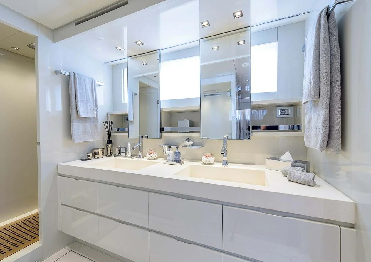 a bathroom with a large mirror aboard MUSHA Yacht for Sale