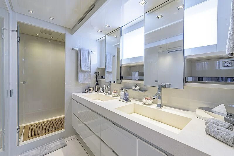 a bathroom with a large mirror aboard MUSHA Yacht for Sale