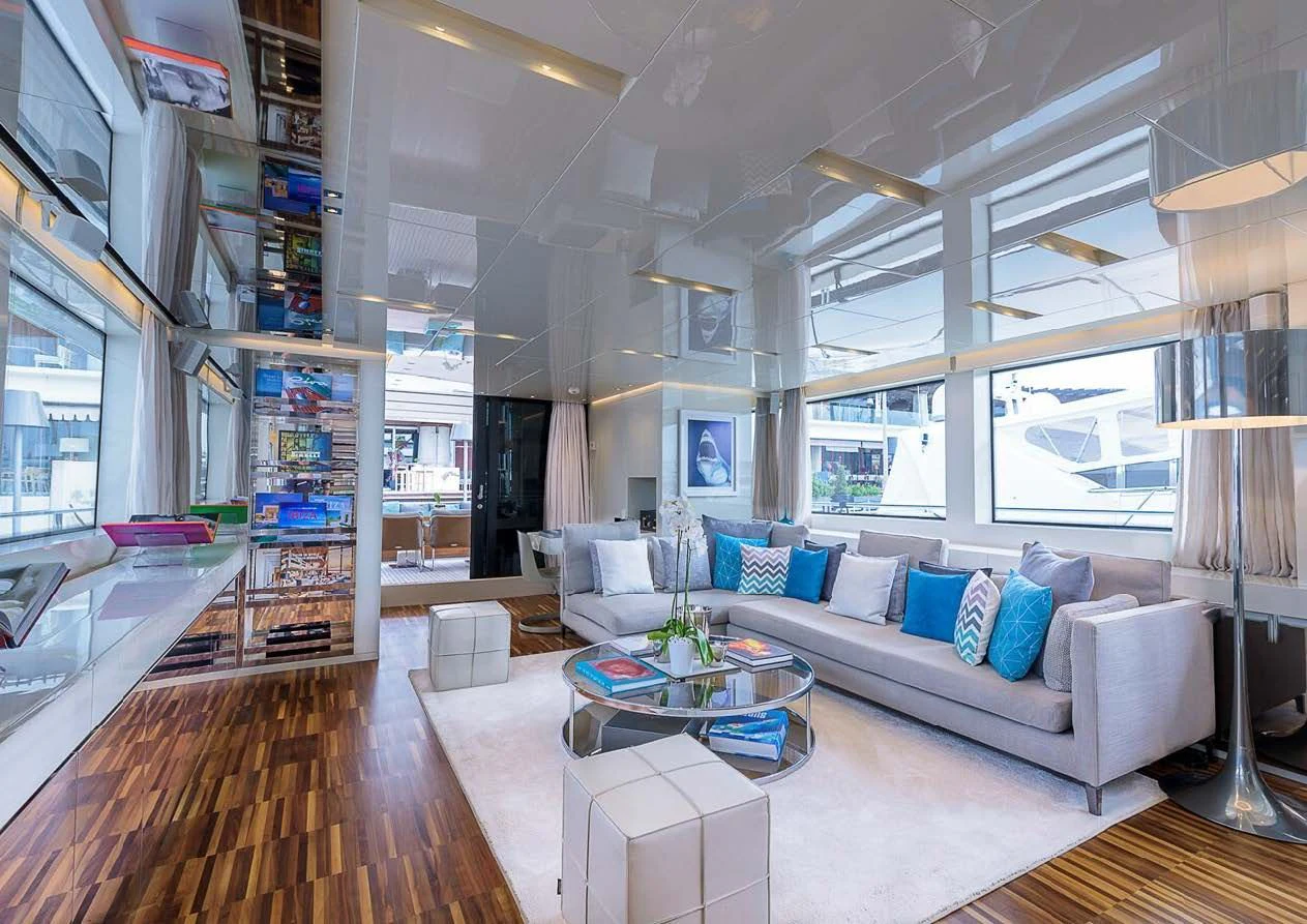 a living room with a large window aboard MUSHA Yacht for Sale