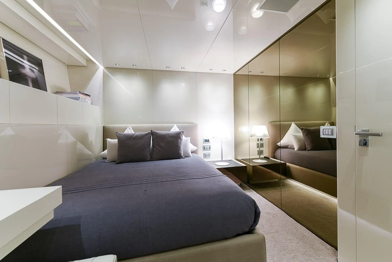 a room with a bed and a couch aboard MUSHA Yacht for Sale