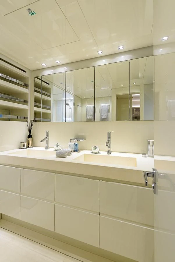 a bathroom with a large mirror aboard MUSHA Yacht for Sale