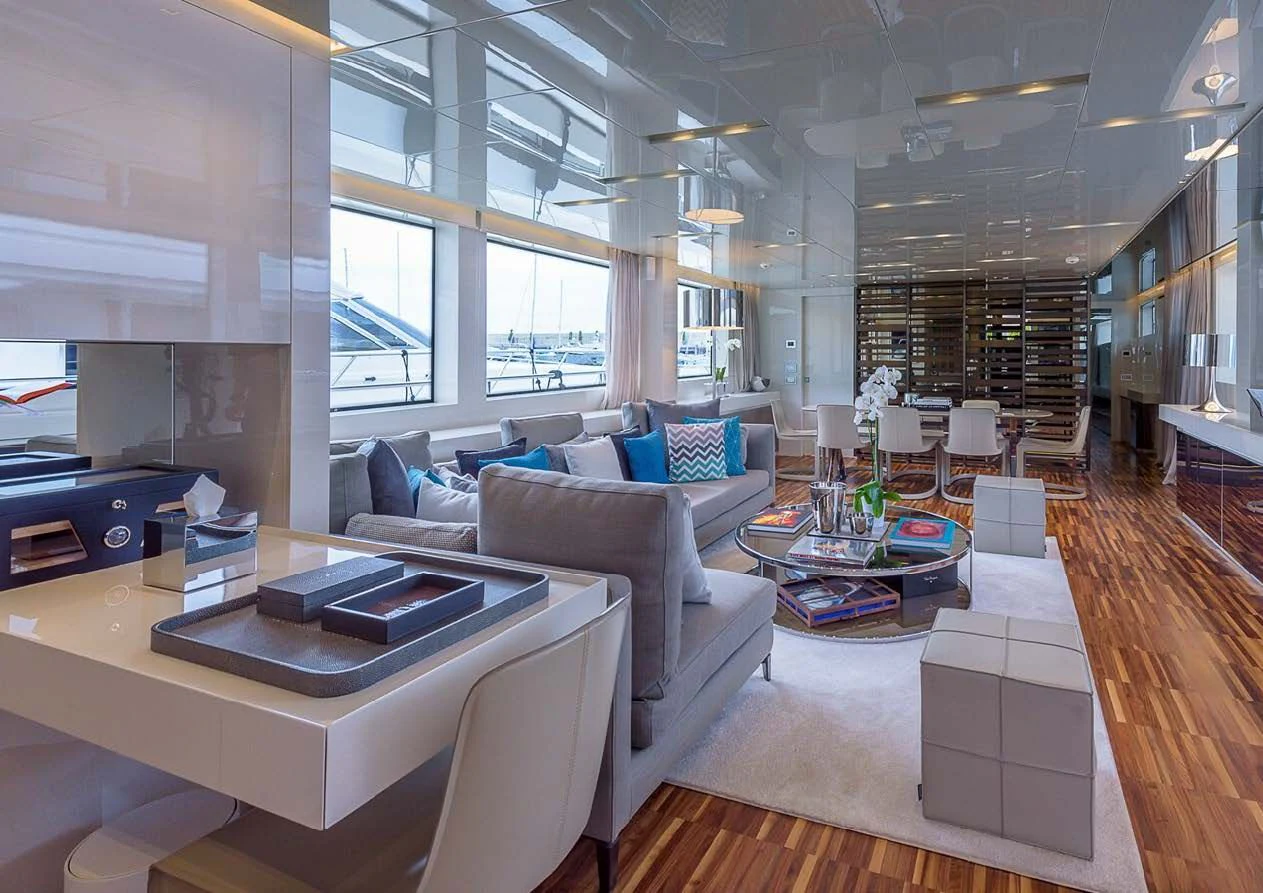 a living room with a large window aboard MUSHA Yacht for Sale