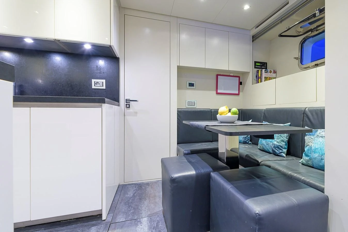 a room with a couch and a table aboard MUSHA Yacht for Sale