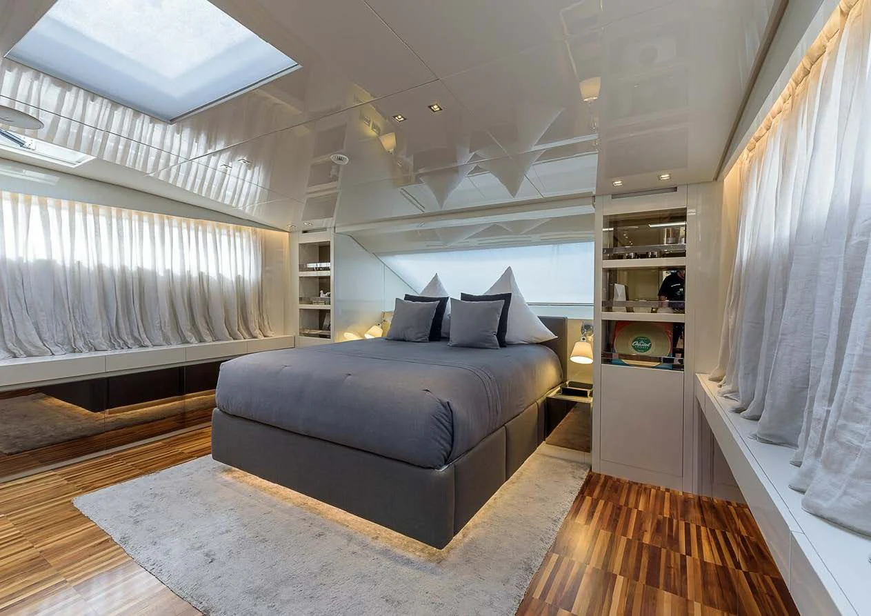 a bedroom with a large bed aboard MUSHA Yacht for Sale