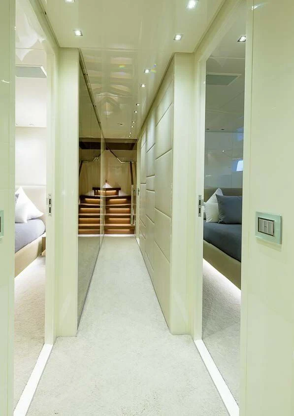 a hallway with a couch and a door aboard MUSHA Yacht for Sale