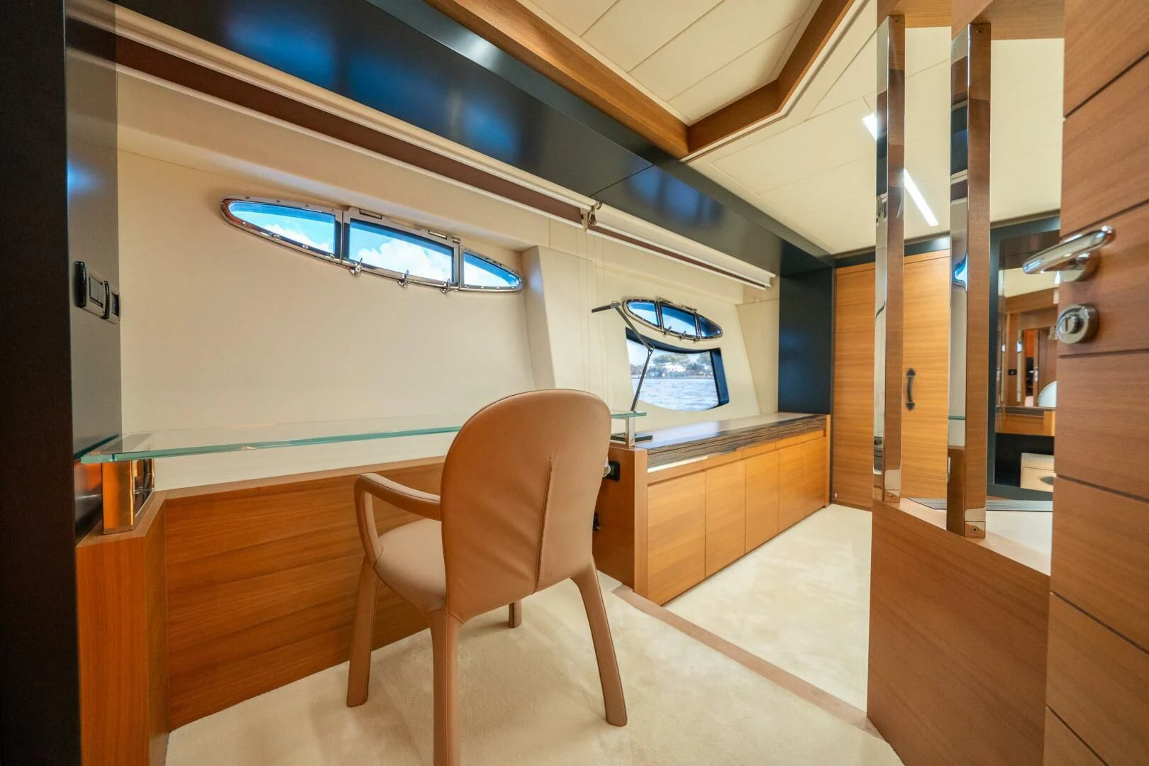 a chair in a room aboard CERSEI Yacht for Sale