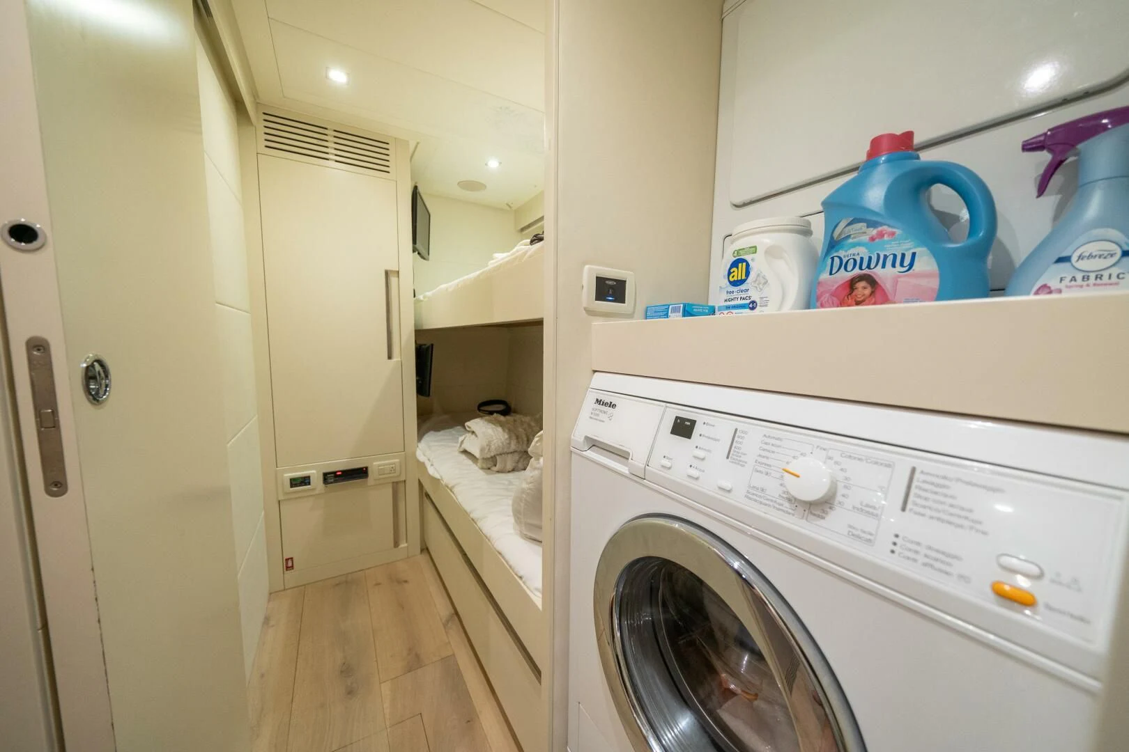 a laundry room with a washing machine aboard CERSEI Yacht for Sale