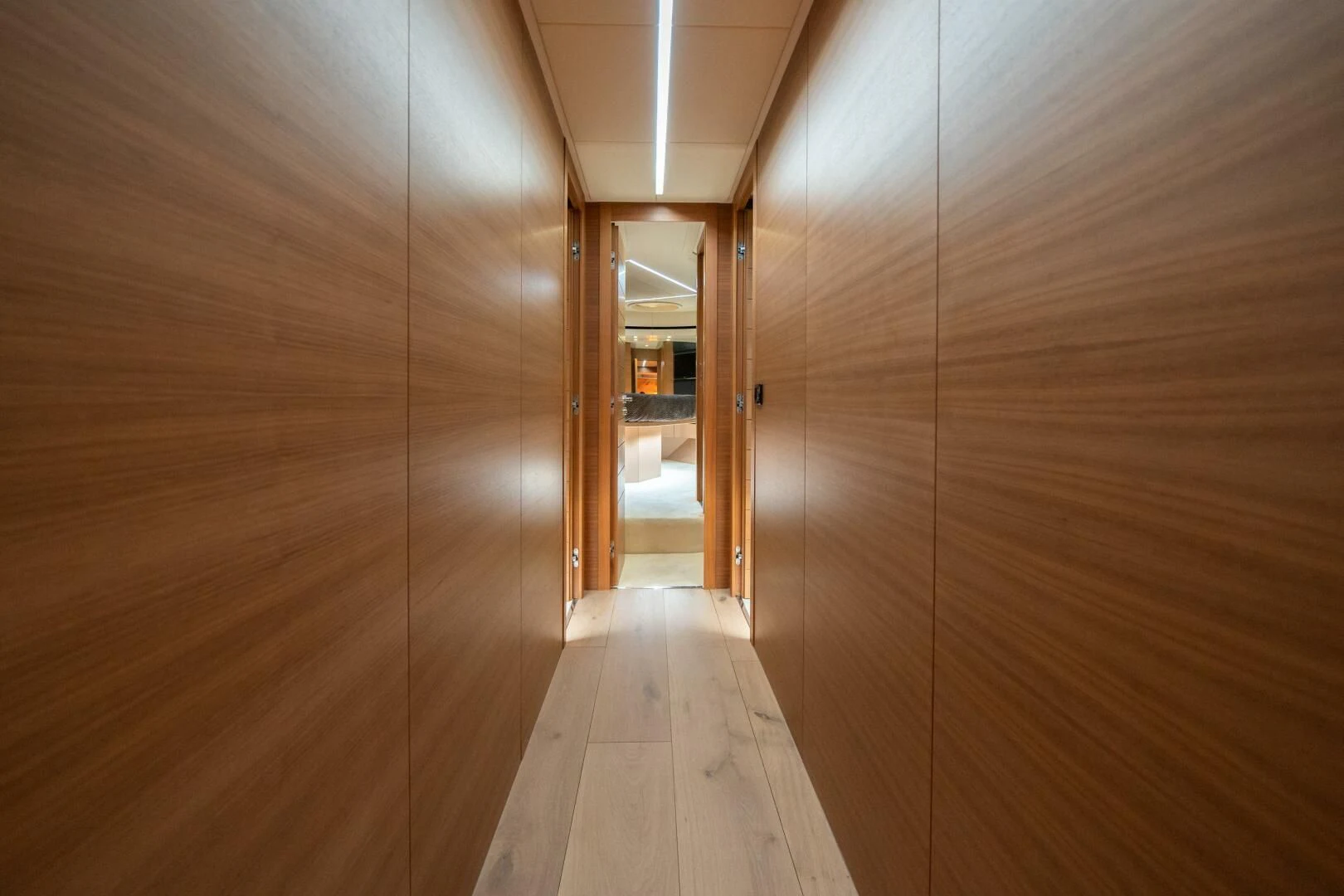 a wood hallway with a wood floor aboard CERSEI Yacht for Sale