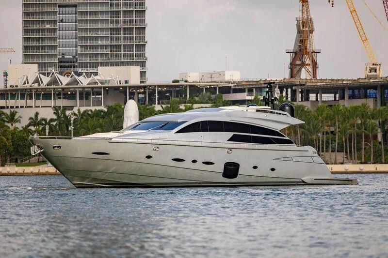 a white yacht in a body of water aboard CERSEI Yacht for Sale