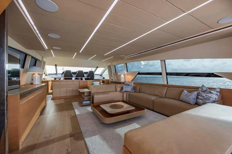a living room with a large window aboard CERSEI Yacht for Sale