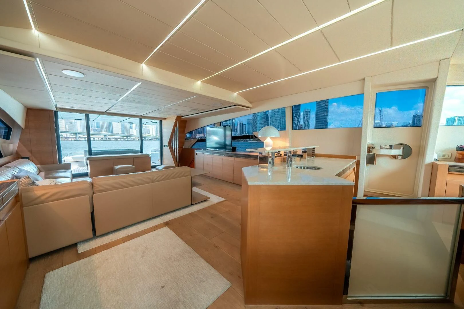 a room with a couch and a table aboard CERSEI Yacht for Sale