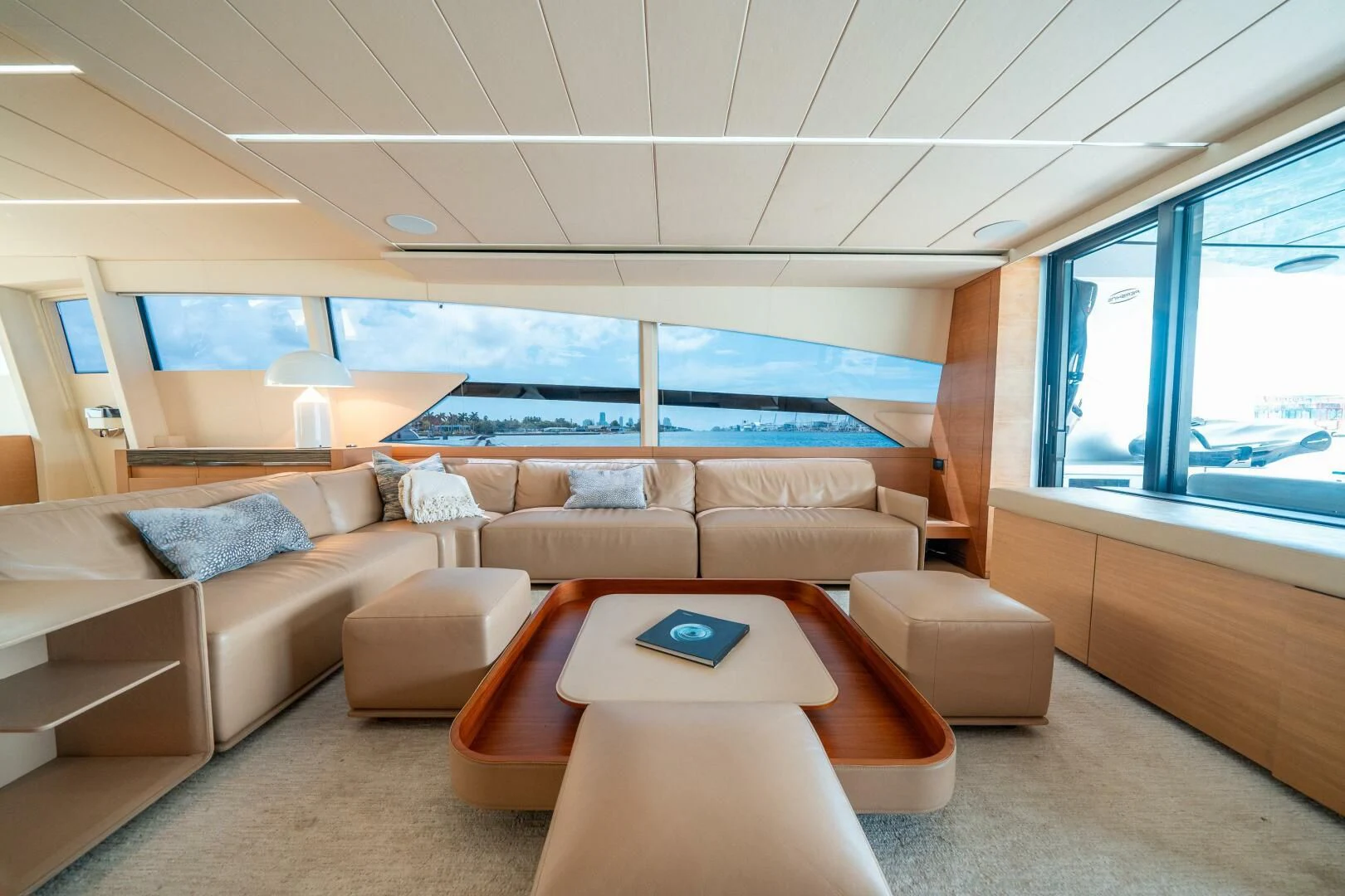 a living room with a large window aboard CERSEI Yacht for Sale