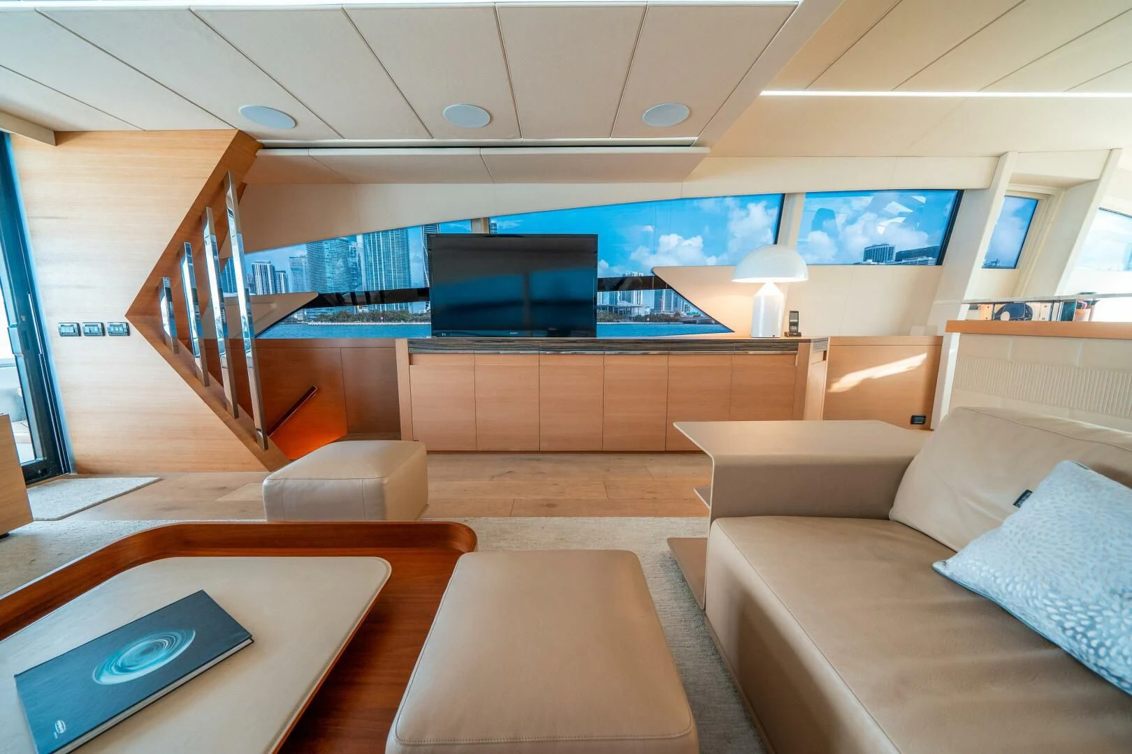 a room with couches and a table aboard CERSEI Yacht for Sale
