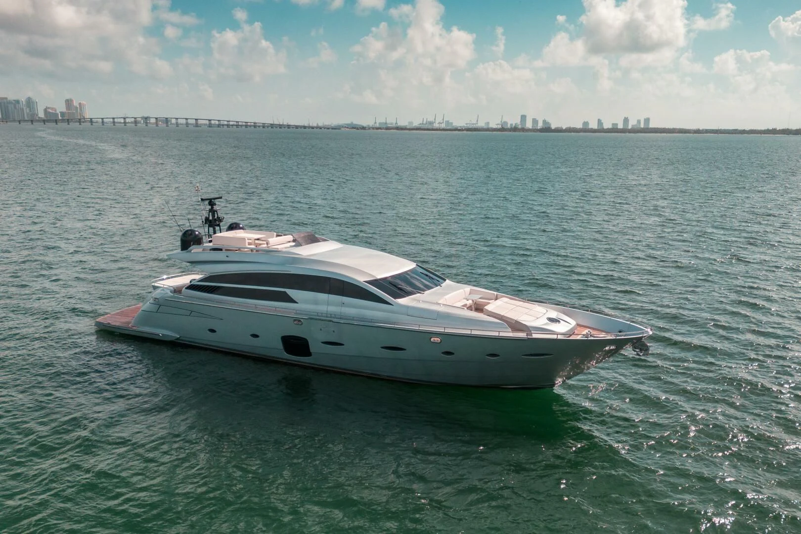 a white boat in the water aboard CERSEI Yacht for Sale