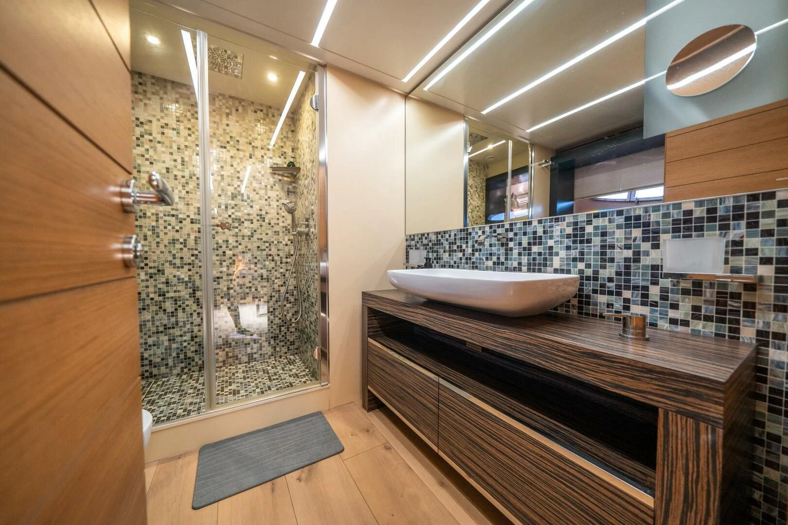 a bathroom with a marble counter top aboard CERSEI Yacht for Sale