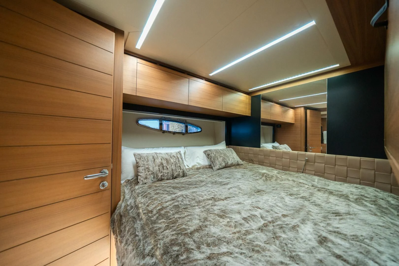 a bed in a room aboard CERSEI Yacht for Sale