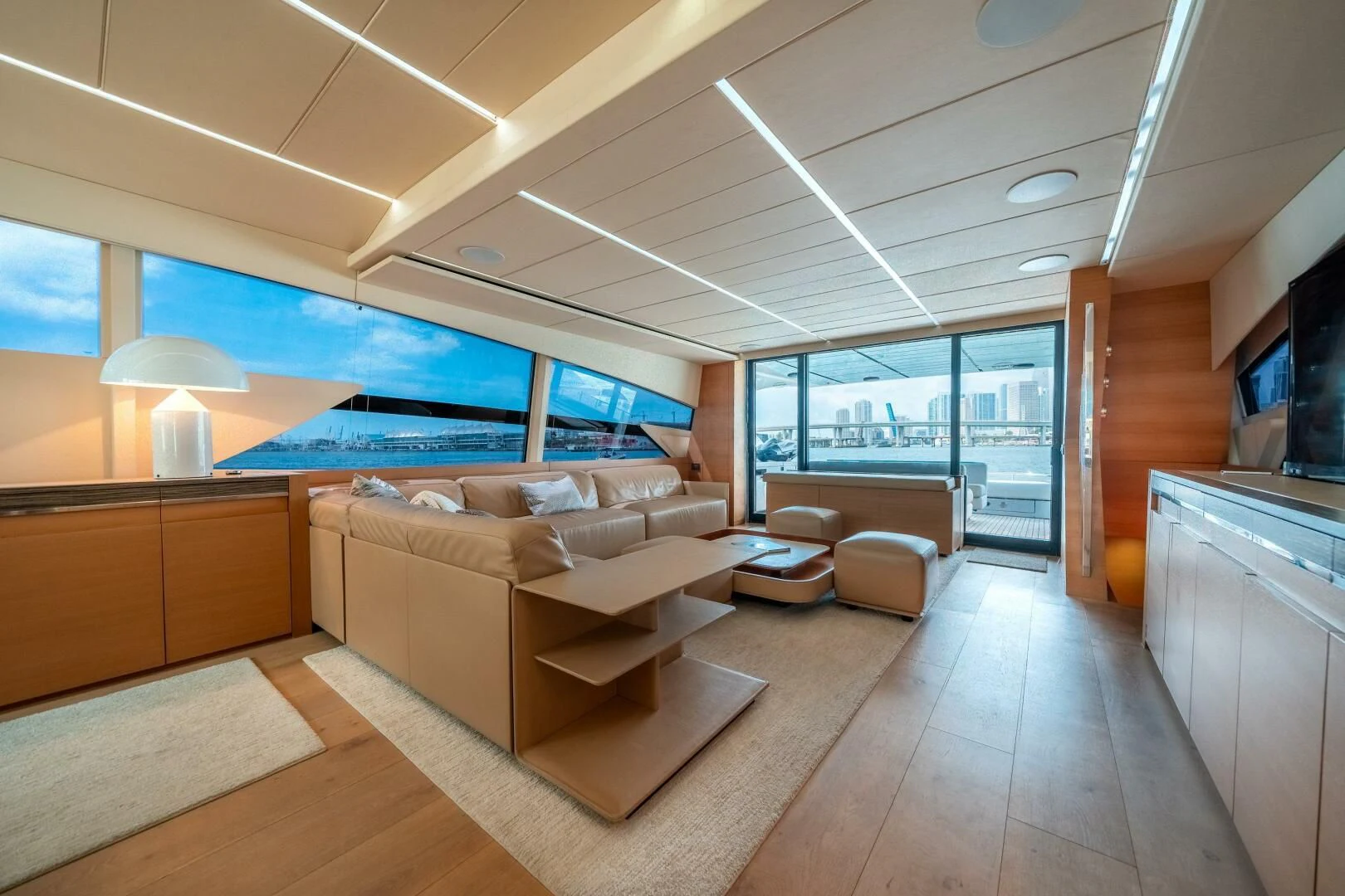 a room with a couch and a tv aboard CERSEI Yacht for Sale