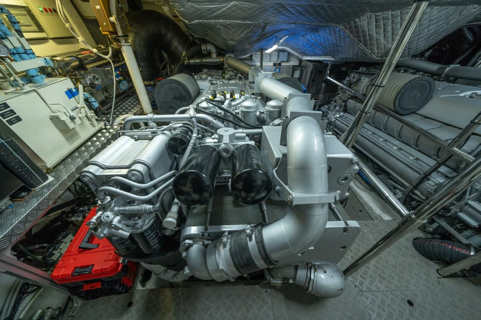 a car engine with a red car aboard CERSEI Yacht for Sale
