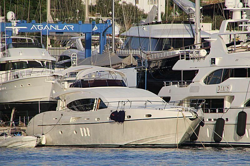 several boats docked at a pier aboard ADA Yacht for Sale