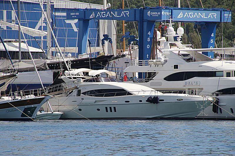 several boats in a harbor aboard ADA Yacht for Sale
