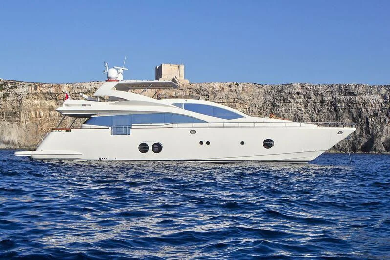 a white boat in the water aboard RED ROSE Yacht for Sale