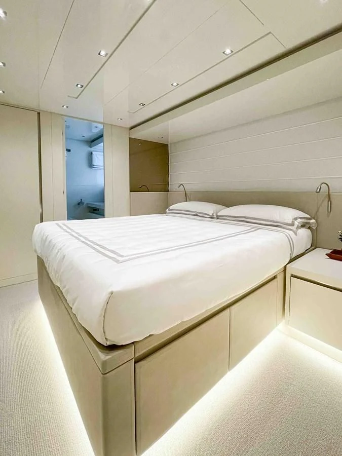 a bed in a room aboard SANLORENZO SX88/81 Yacht for Sale