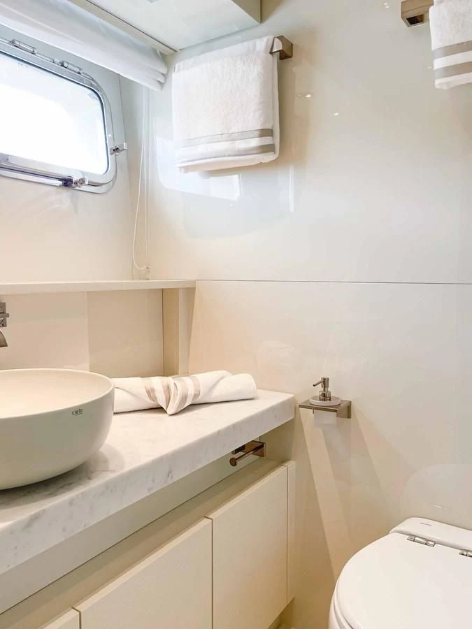 a bathroom with a sink and a toilet aboard SANLORENZO SX88/81 Yacht for Sale