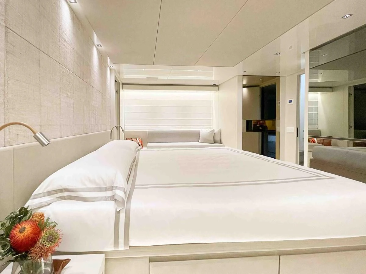 a bed with white sheets aboard SANLORENZO SX88/81 Yacht for Sale
