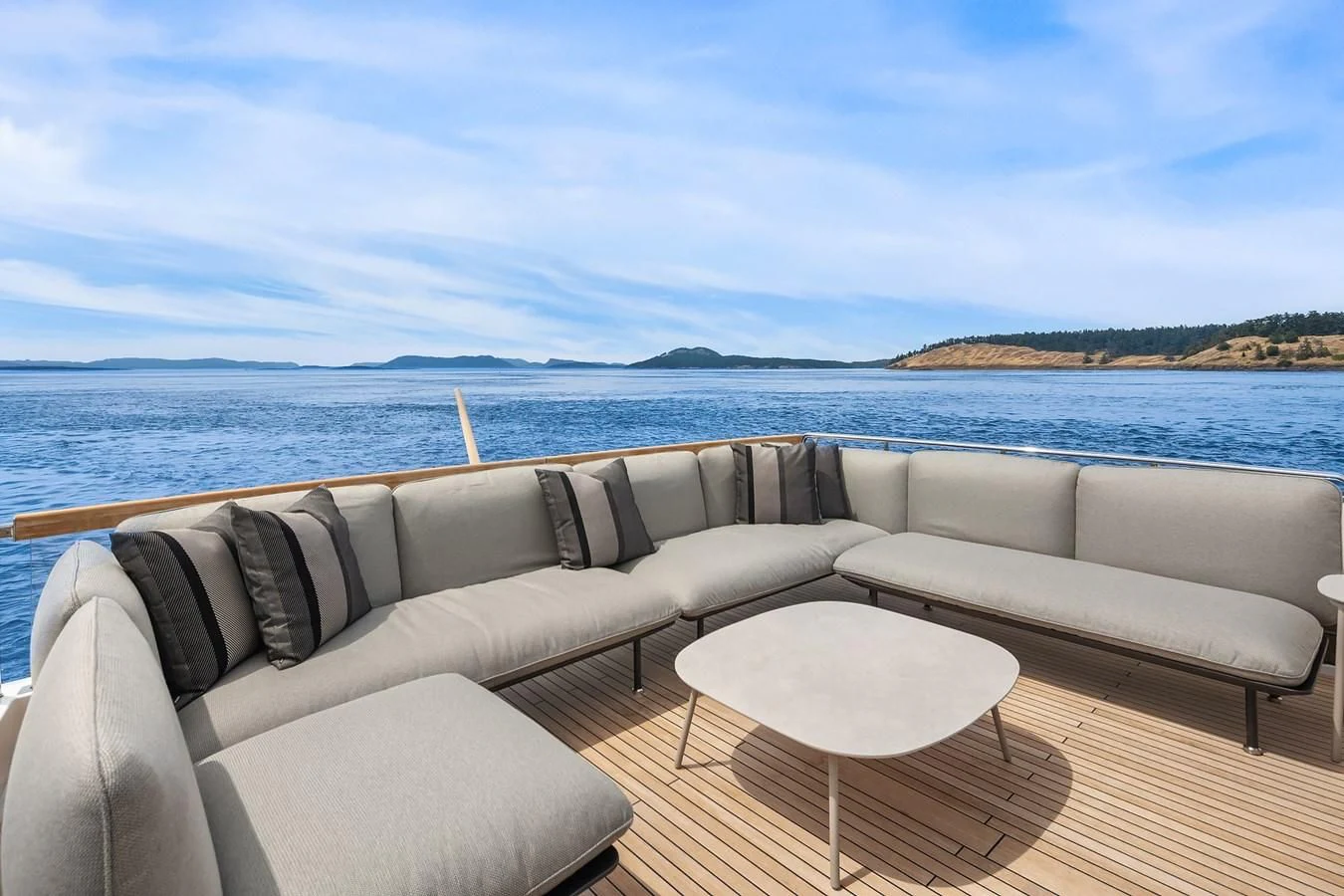 a couch and a table on a boat aboard SANLORENZO SX88/81 Yacht for Sale