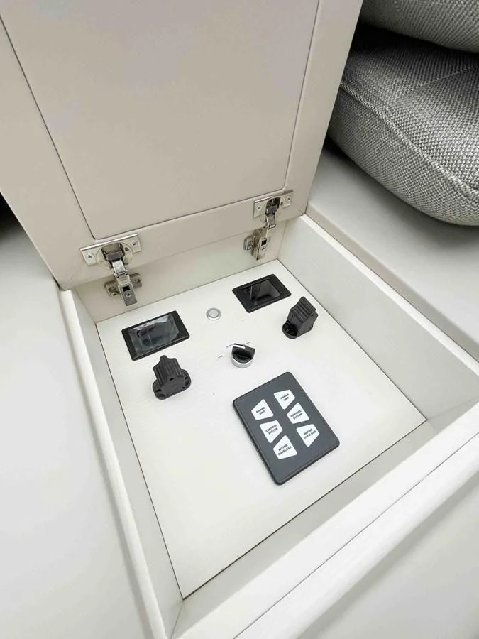 a white cabinet with black buttons aboard SANLORENZO SX88/81 Yacht for Sale