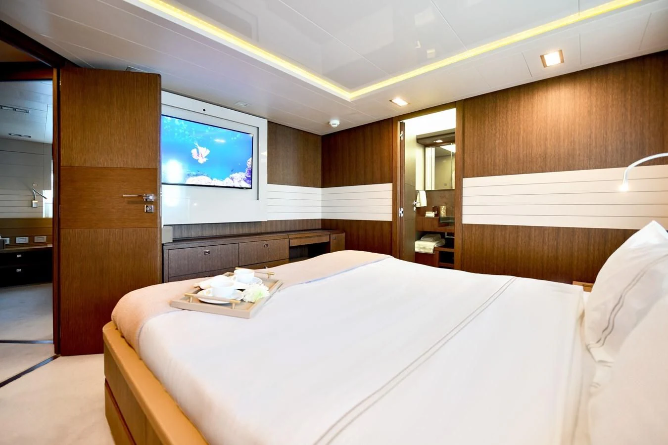 a hotel room with a bed aboard CUSTOM LINE 100 Yacht for Sale