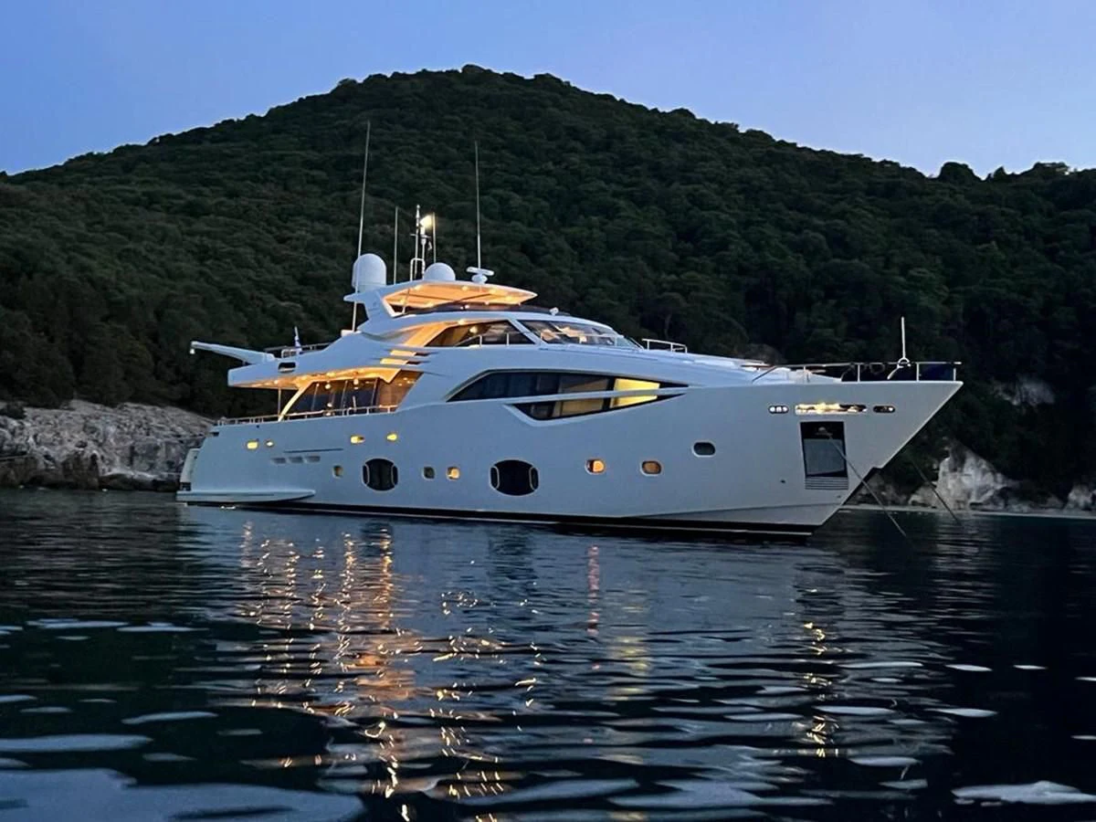 a boat on the water aboard CUSTOM LINE 100 Yacht for Sale