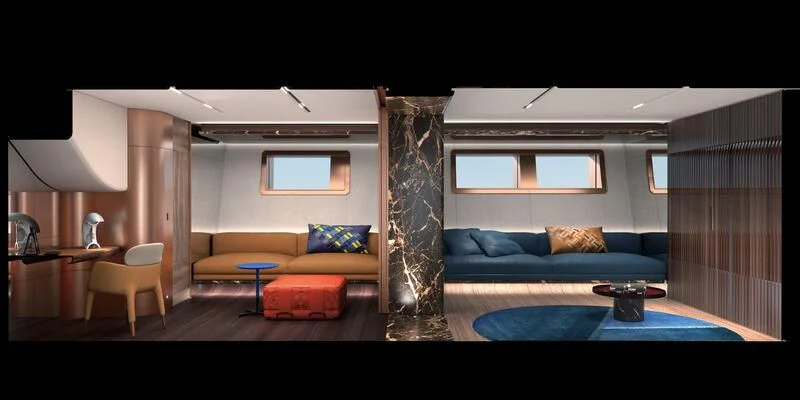 a living room with a blue couch aboard PERINI 47-M Yacht for Sale