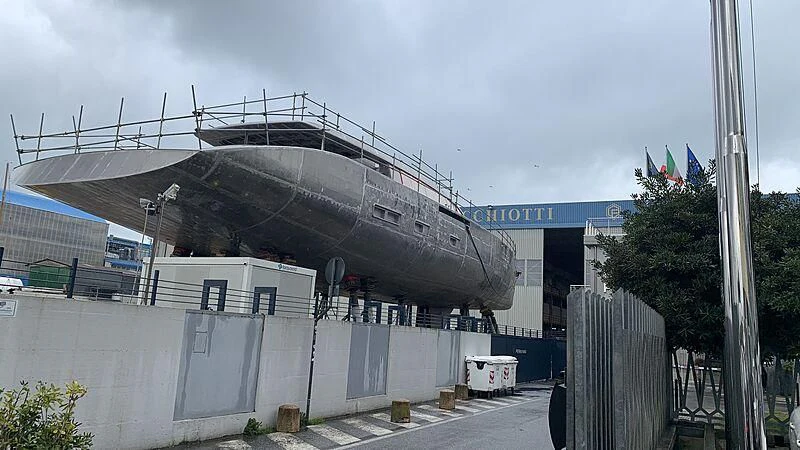 a large ship docked aboard PERINI 47-M Yacht for Sale