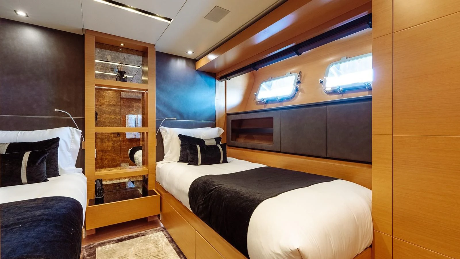 a room with a bed and a tv aboard AWAY Yacht for Charter