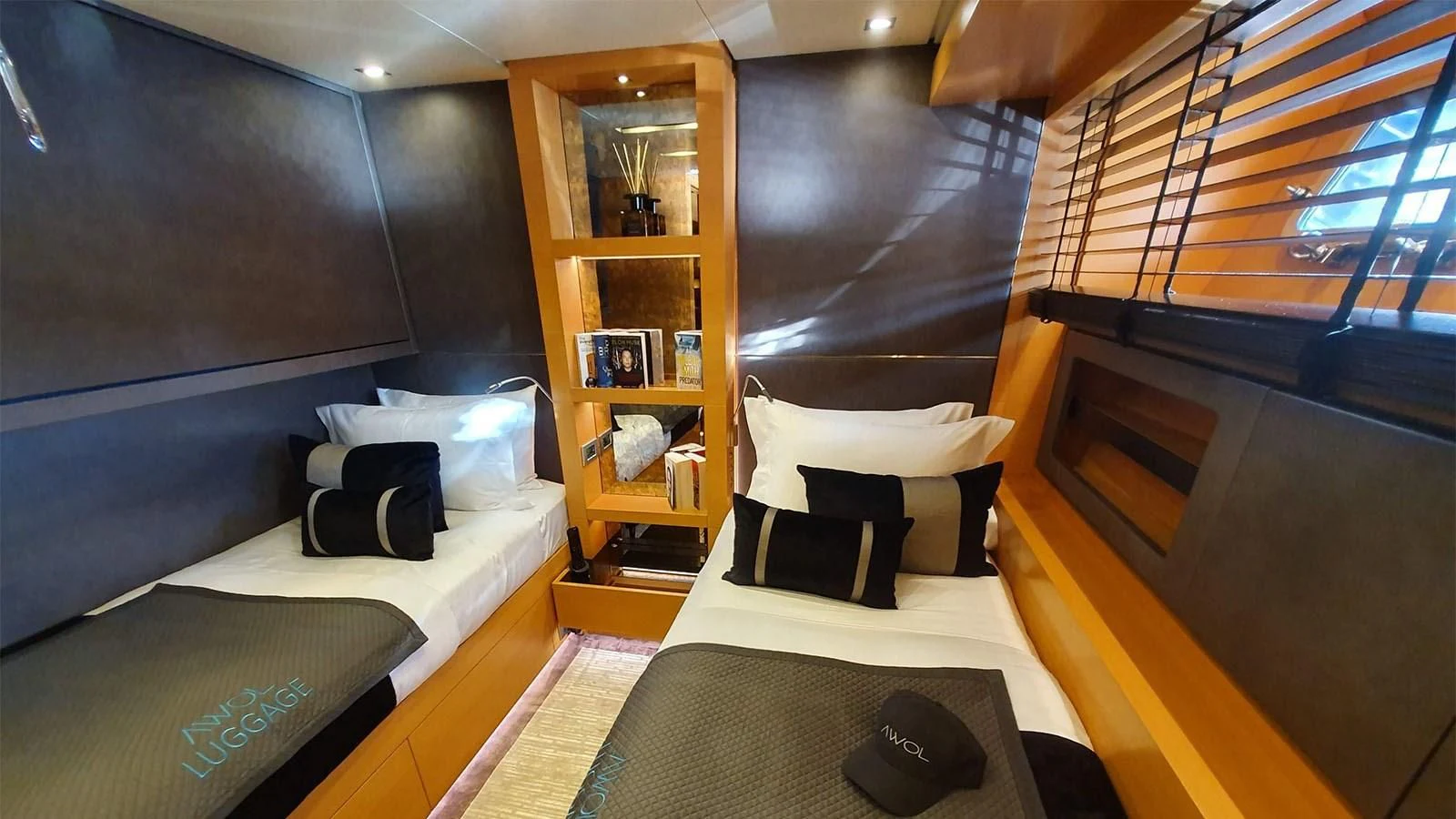 a room with two beds aboard AWAY Yacht for Charter