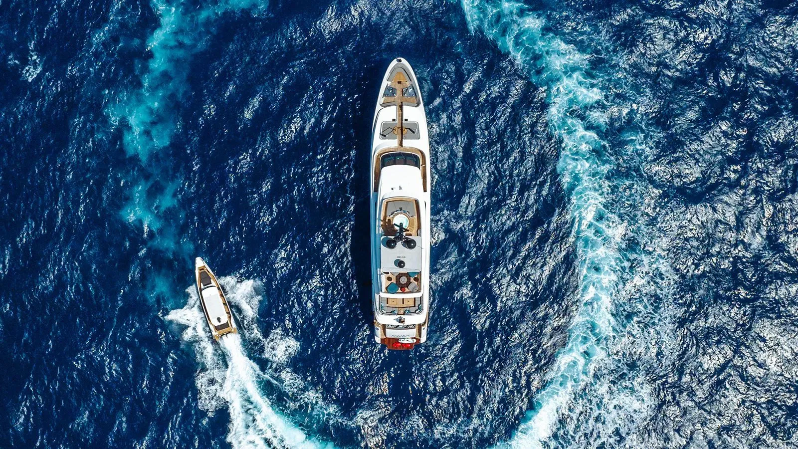 a white and grey space shuttle in the water aboard AWAY Yacht for Charter