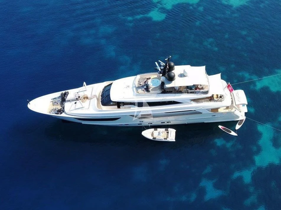 a white boat in the water aboard AWAY Yacht for Charter