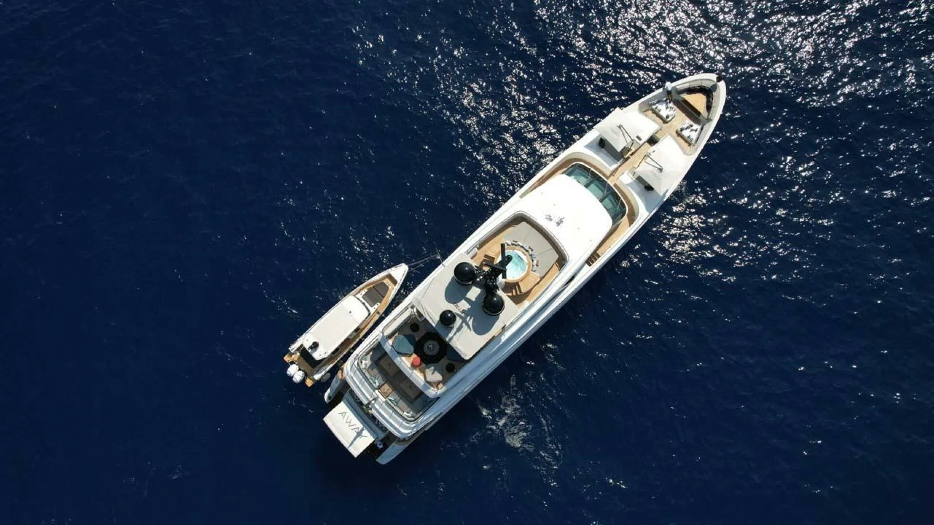 a space shuttle flying over earth aboard AWAY Yacht for Charter