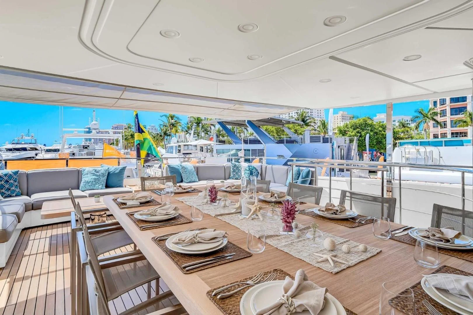 a dining room with a large window aboard AWAY Yacht for Charter
