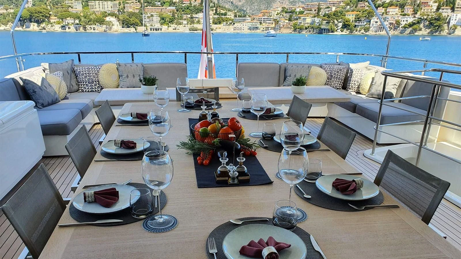 a table with plates and glasses on it aboard AWAY Yacht for Charter