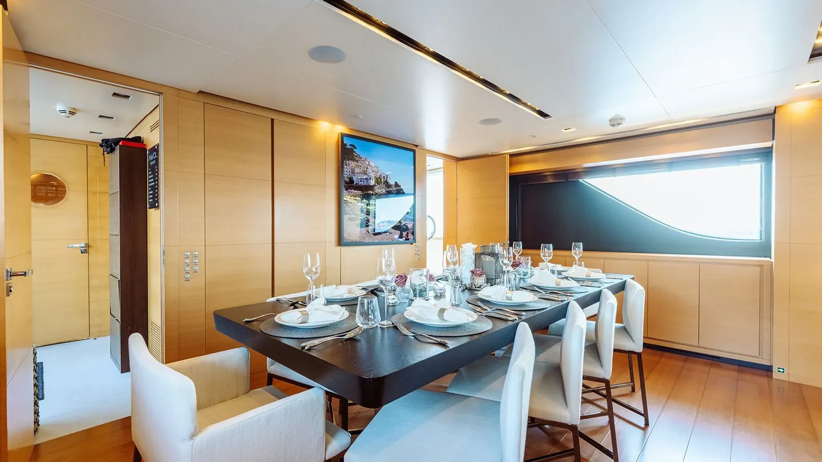 a dining table set for a dinner aboard AWAY Yacht for Charter