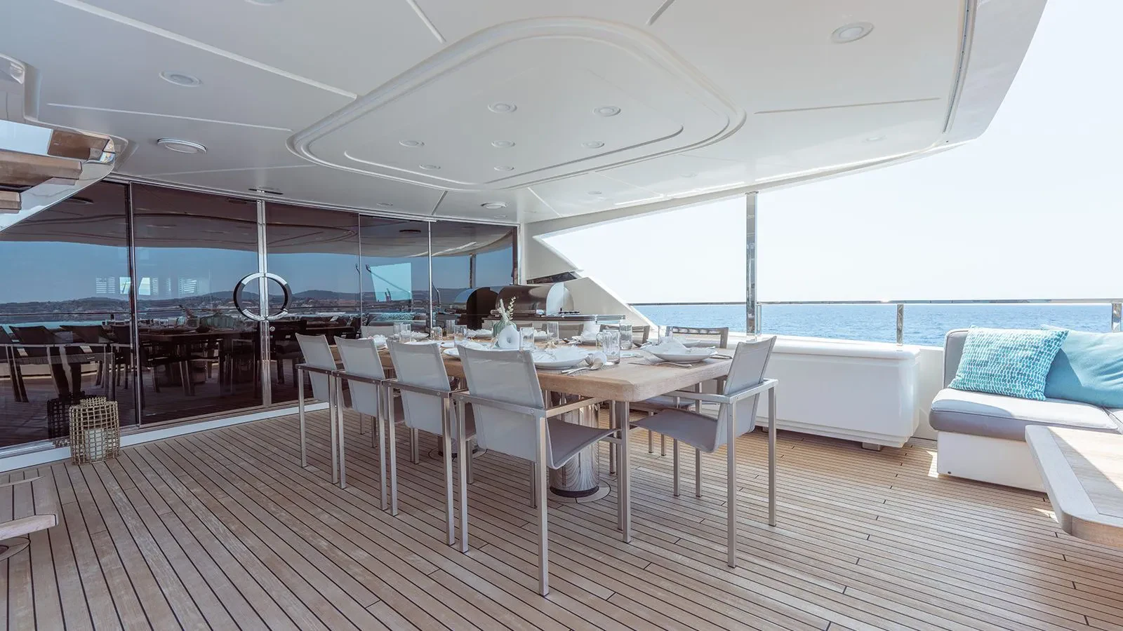 a room with a table and chairs aboard AWAY Yacht for Charter