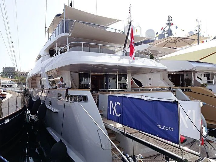 a boat docked at a pier aboard AWAY Yacht for Charter