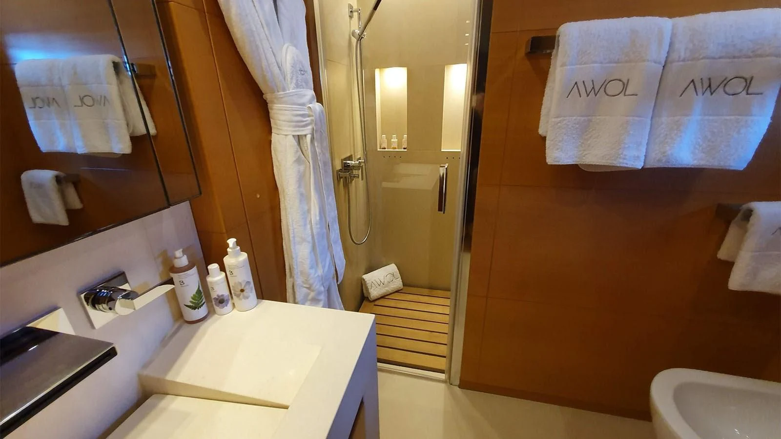a bathroom with a sink and a shower aboard AWAY Yacht for Charter