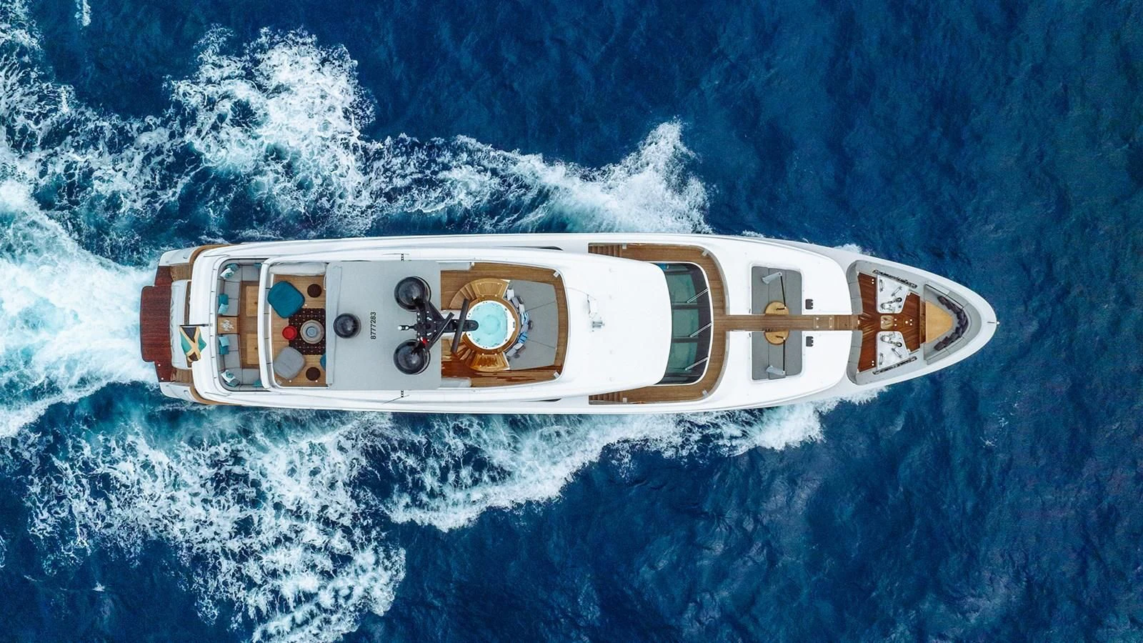 a space ship above the earth aboard AWAY Yacht for Charter