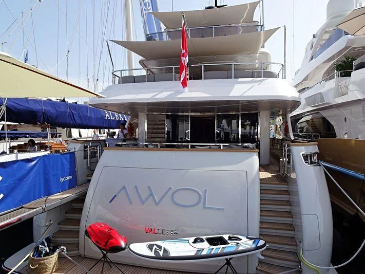 a boat with a sign on the front aboard AWAY Yacht for Charter